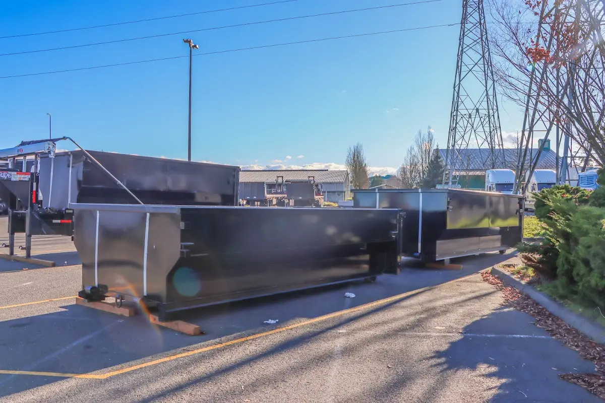 Roll-off dumpster ready for waste disposal at job site for Construction Dumpster Rental in Fayetteville
